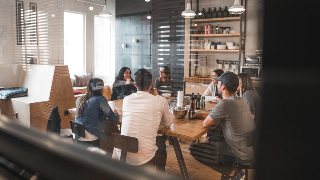 Group of people interacting in an office space